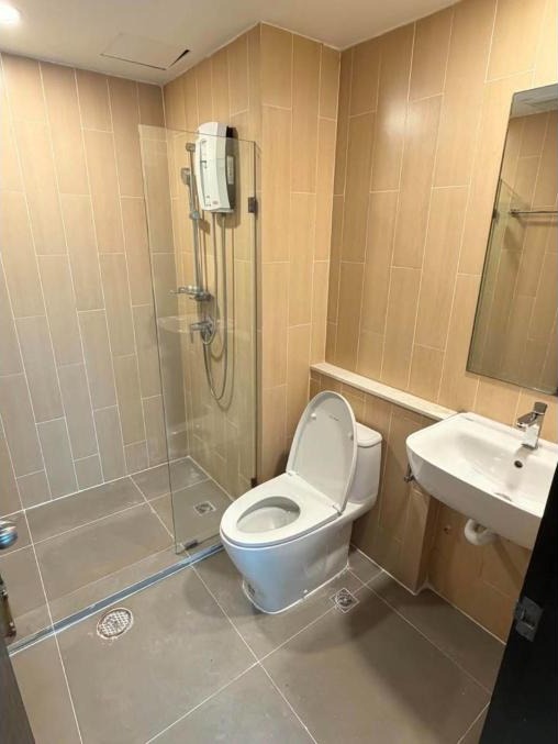 Renovated 1-bed condo for rent at The Centrio, garden pool view – photo 8