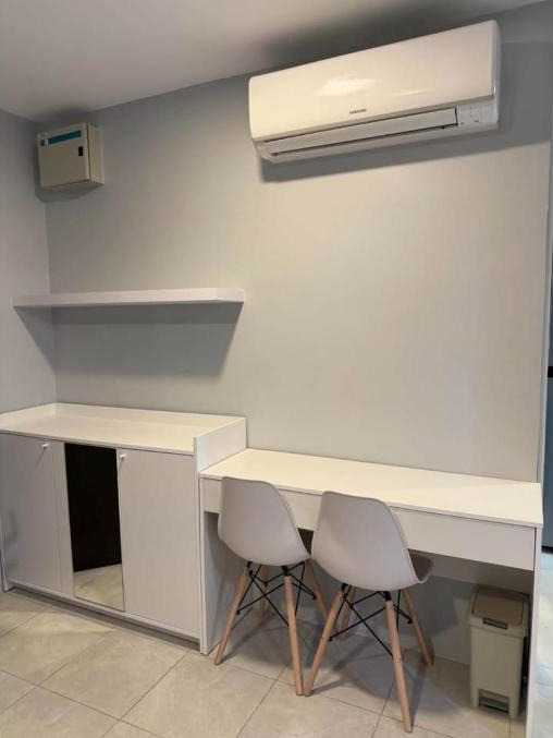 Renovated 1-bed condo for rent at The Centrio, garden pool view – photo 2