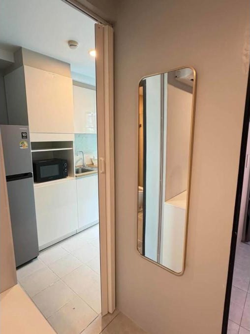 Renovated 1-bed condo for rent at The Centrio, garden pool view – photo 6