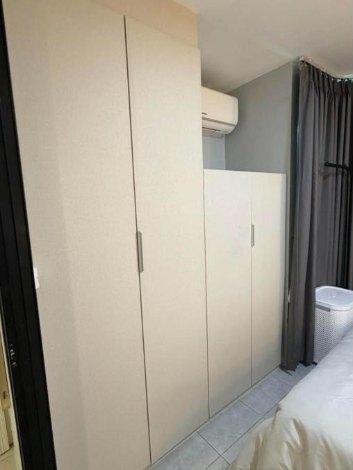 Renovated 1-bed condo for rent at The Centrio, garden pool view – photo 4