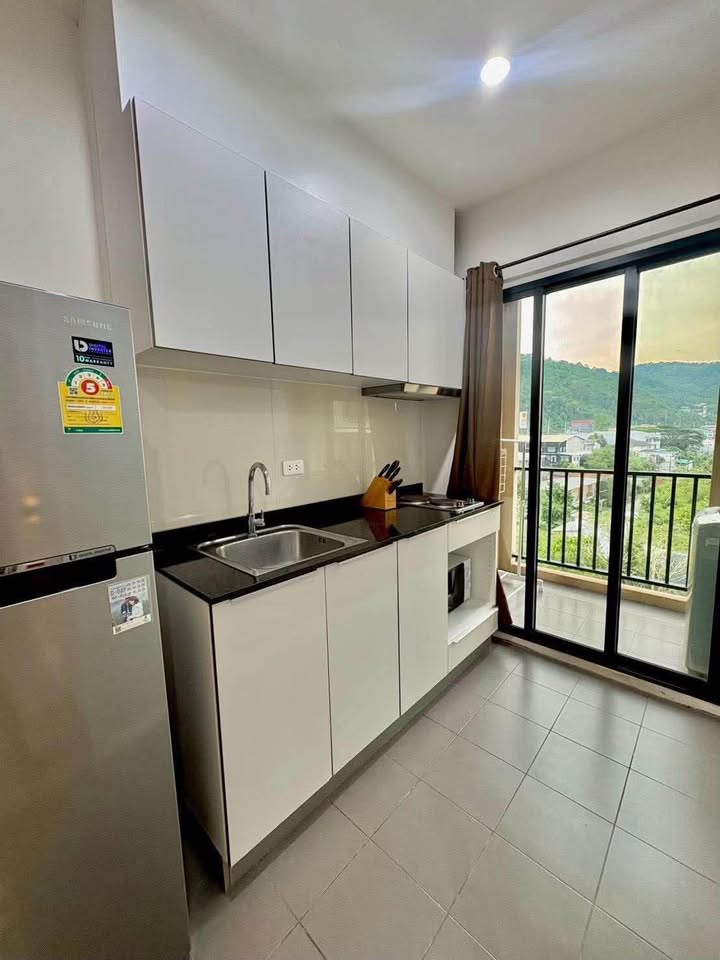 1-bed condo for rent at The Base Uptown, Building C – photo 4