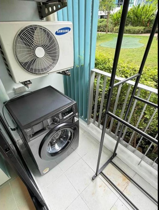 Renovated 1-bed condo for rent at The Centrio, garden pool view – photo 10